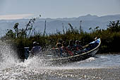 Inle Lake Myanmar. All the buildings are constructed on piles. Residents travel around by canoe, but there are also bamboo walkways and bridges over the canals, monasteries and stupas. 